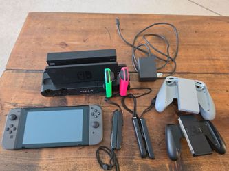 Nintendo Switch + microSD + games + accessories