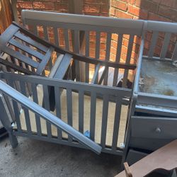 Kitchen Table With Chairs And Baby Bed.