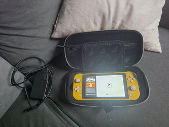 Nintendo Switch Lite w/ zelda case and charger