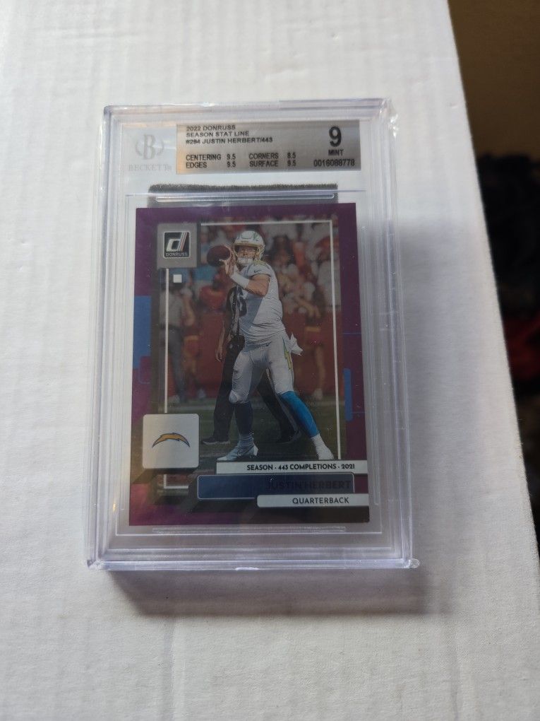 2020 Panini Donruss Justin Herbert Purple Rated Rookie Stat Line #'d/443 Beckett 9