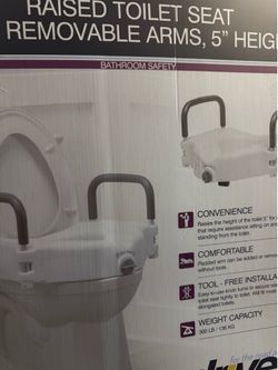 Raised toilet seat