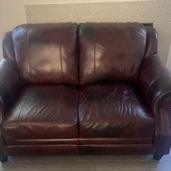 Love seat, Red-brown patchy couch