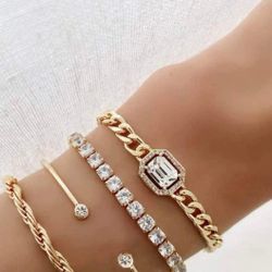 4 Stack Of Gold Bracelets 