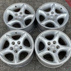 Jeep Wrangler 16-inch stock aluminum wheels 5 on 4.5 lug pattern fits Cherokee, etc