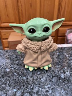 Star Wars Bop It! Mandalorian. “The Child” Grogu Baby Yoda.  Size 5 inches Tall No Box. Works perfect.  Has been on display in a cabinet with a Star W
