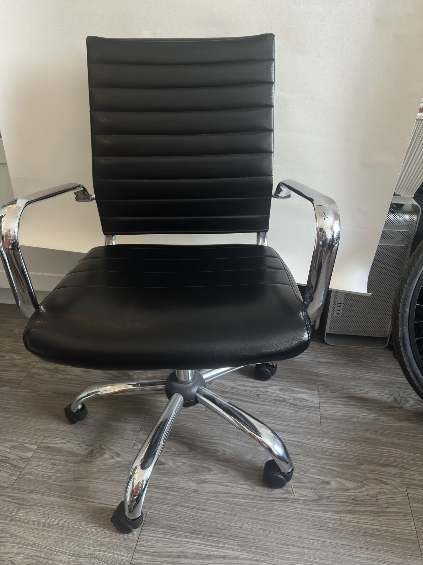 Modern Black Faux Leather Office Chair with Chrome Frame & Casters