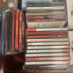 24 Christmas CDs. $12