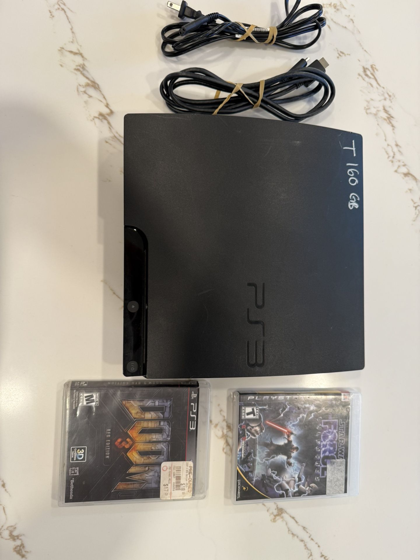 PS3 Slim - 500 GB Tested with cables and 2 games (no controller)
