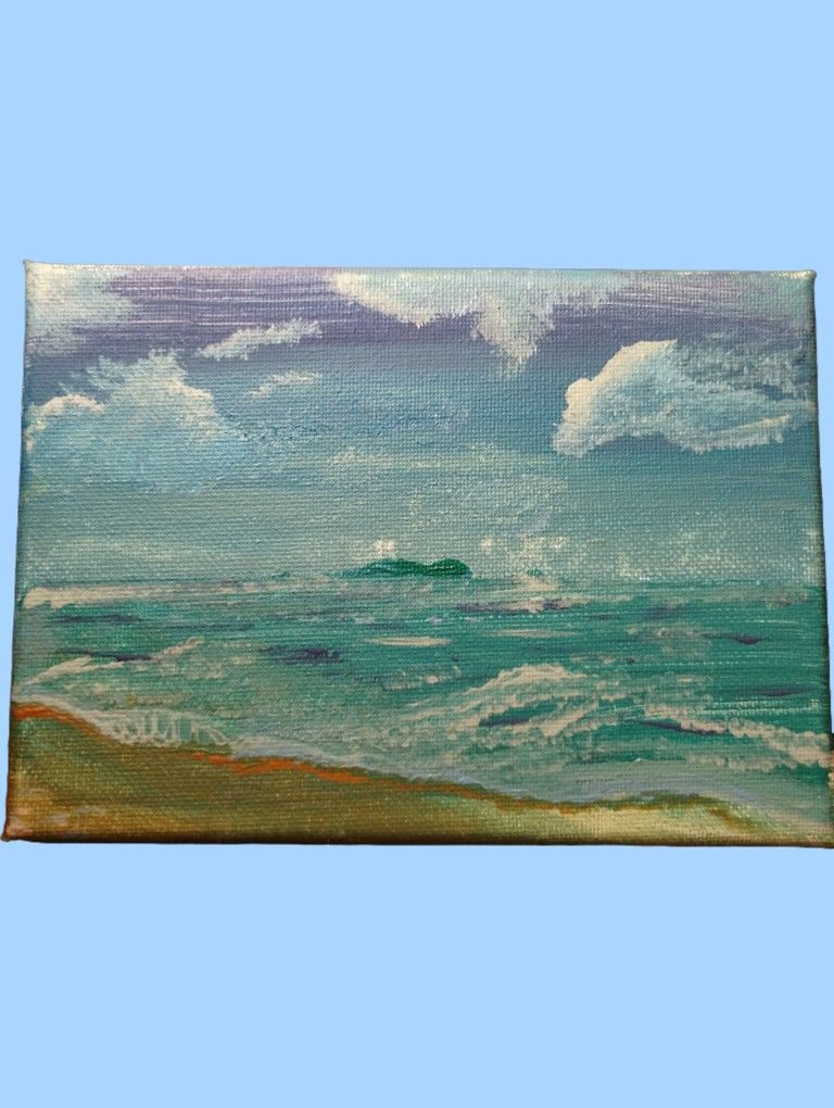 A Small Painting Of A Beach