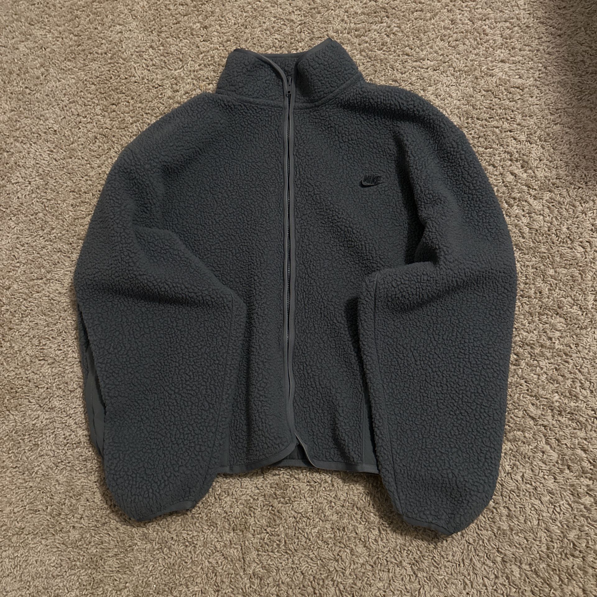 Nike means coat
