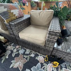 Sunbrella Beige 5 Person outdoor sectional, chair and table