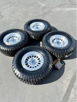 Brand New KMC IMS 17x8.5 Wheels and 35/12R17 All Terrain Tires 6x139 -10 Offset