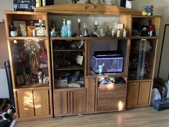 Entertainment Center 100 OBO 73 1/2 in Tall 102in Wide With Middle Piece On Picture.