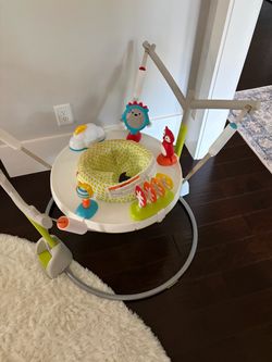 Skip Hop jump scape baby bouncer- like new