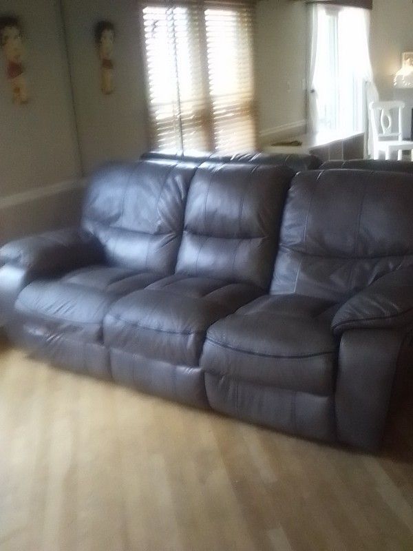 Leather Sofa Reclines On Both Ends $50