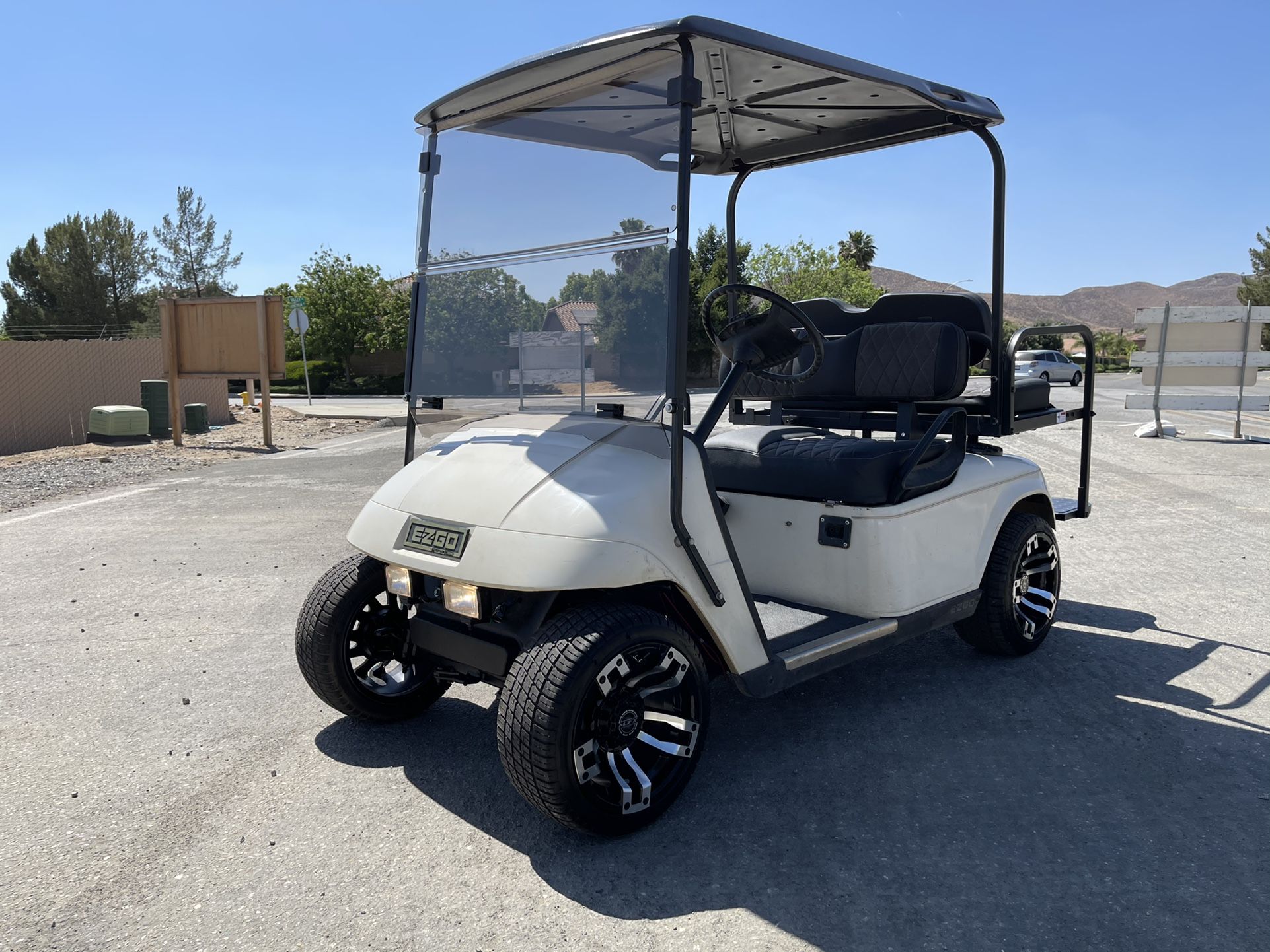 Photo 36 Volt EZGO TXT PDS Golf Cart 4 Seater