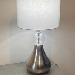 Contemporary Table Lamp With The Brushed Nickel Base And Round Glass Insert H25”