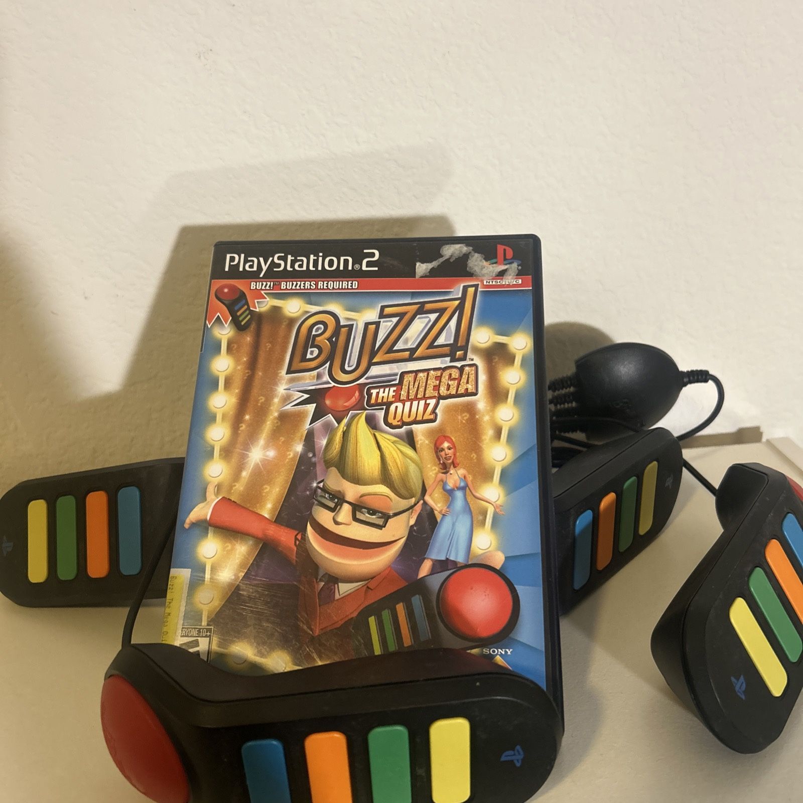 Buzz The MEGA Quiz Game and Buzz Controllers (Sony PlayStation 2 PS2)