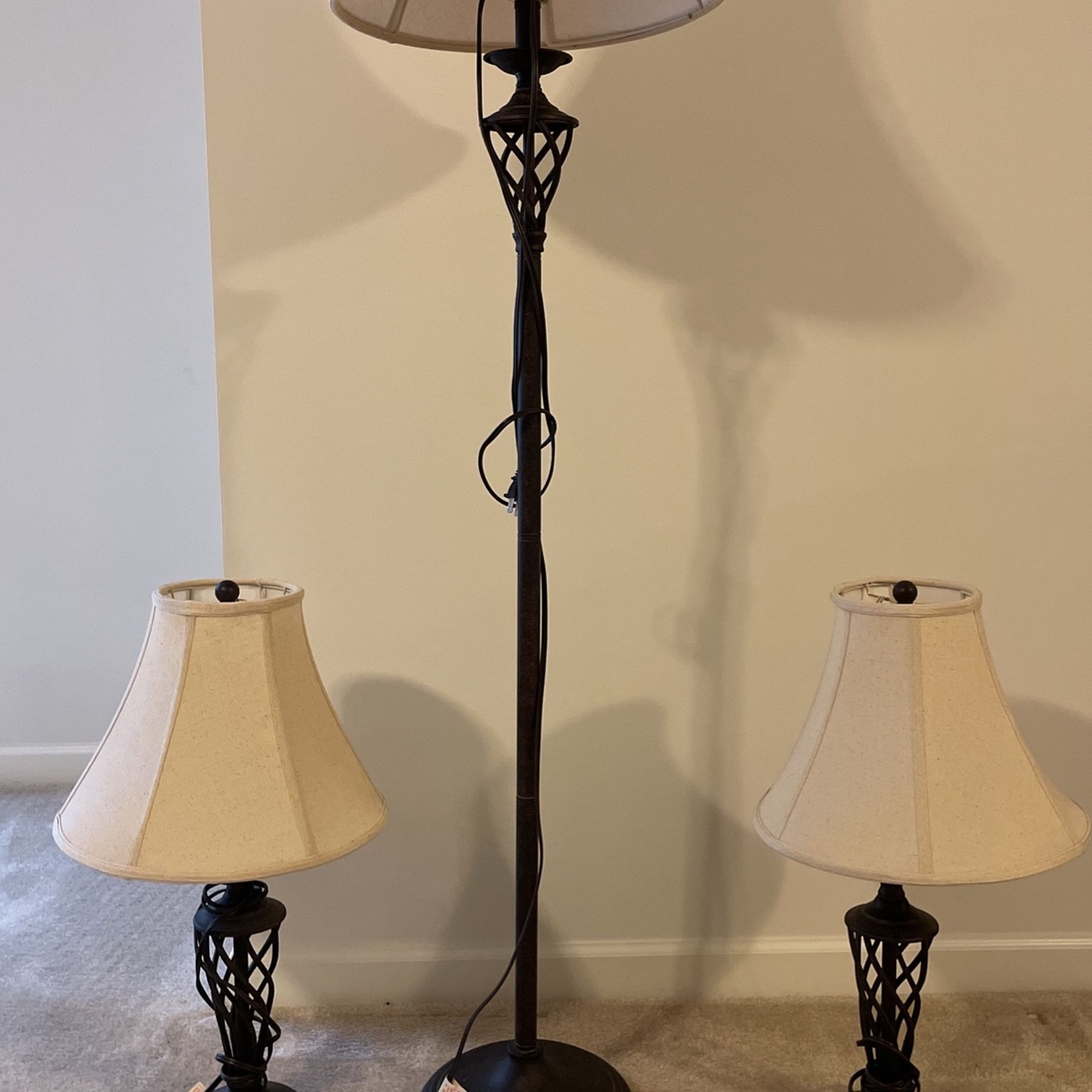 Three dark brown antique metal lamps a great conversation piece will accept best offer