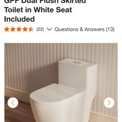 12in. Rough-in Elongated One-piece Toilet 1.0/1.6 GPF Dual Flush Skirted Toilet in White Seat Included