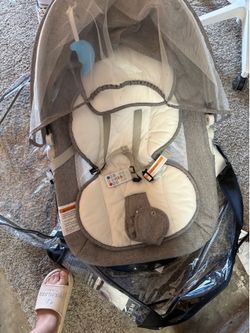 Side rocking baby swing