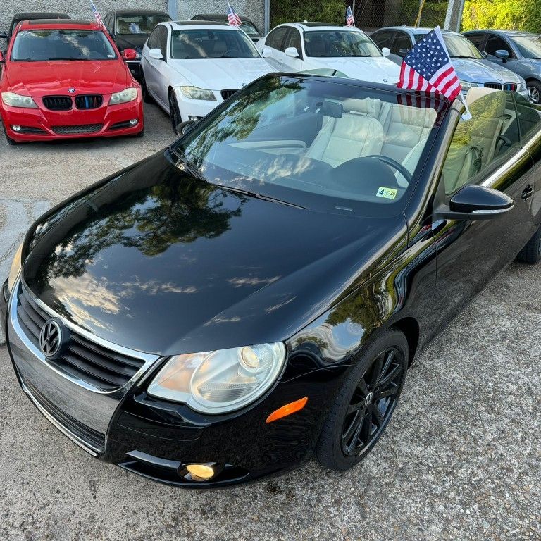 2009 VOLKSWAGEN EOS 2.0T HARDTOP CONVERTIBLE With SUNROOF

ONE OWNER ! 103k low miles!
FINANCING AVAILABLE THROUGH LENDERS!
CLEAN CARFAX!
CLEAN TITLE!