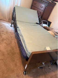 Premium Axios Adjustable Hospital Bed with Mattress & Safety Rails – Excellent Condition!