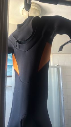 nine year-old custom Japanese rubber, spring suit, long arm, short leg