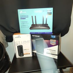 .Arris, Netgear And Tp-link Cable Modem  Routers in Like New Condition 