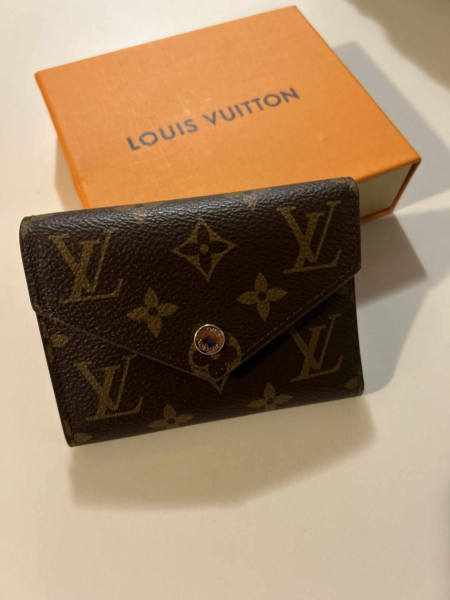 LV Women’s Brown Monogram Victorine Wallet