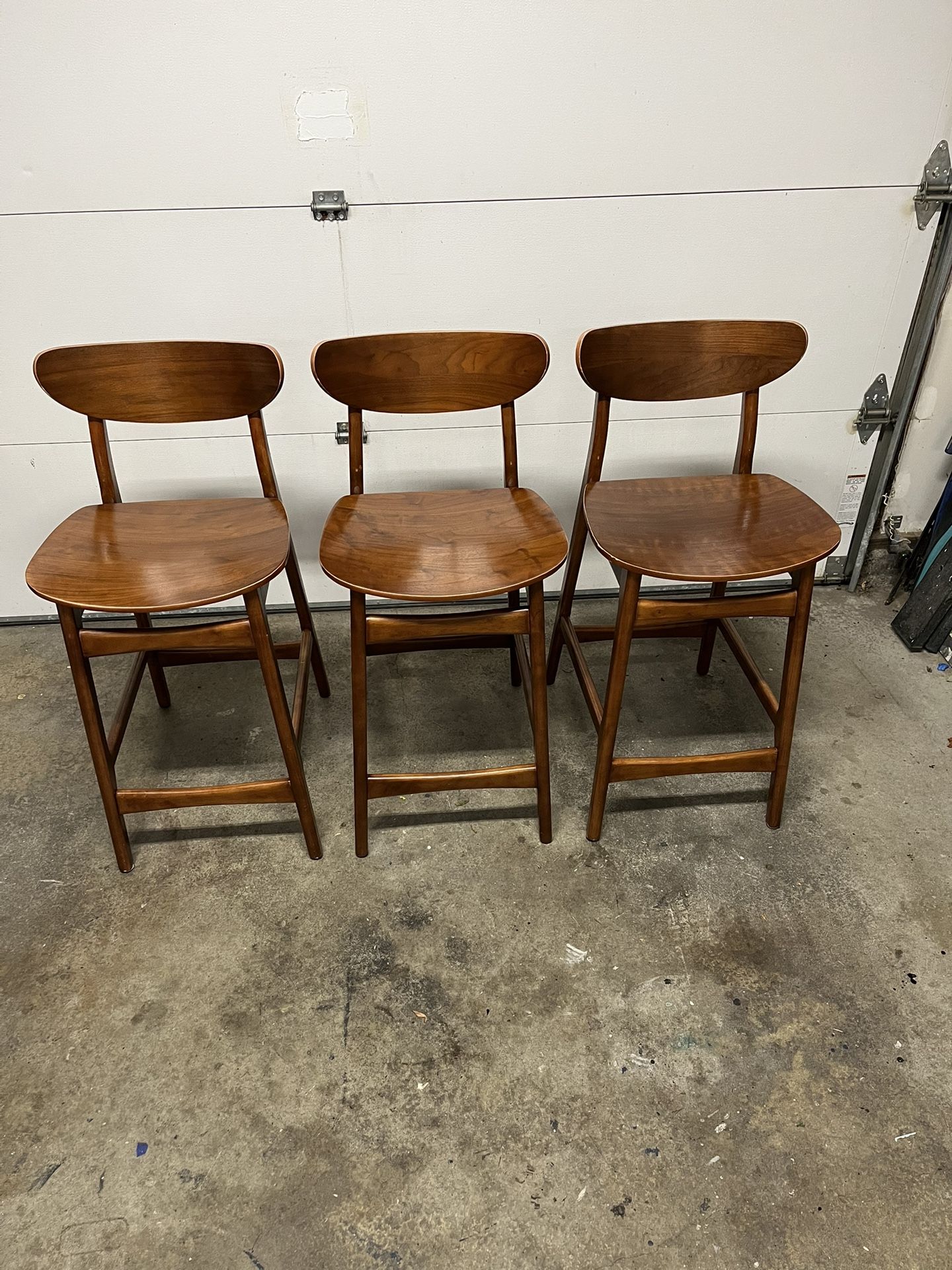 3- West Elm Classic Café Counter Stools in a Walnut finish.