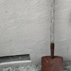 Vintage shovel, canes, umbrella, crutches