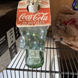Coca Cola bottle 6.5oz with souvenir marbles