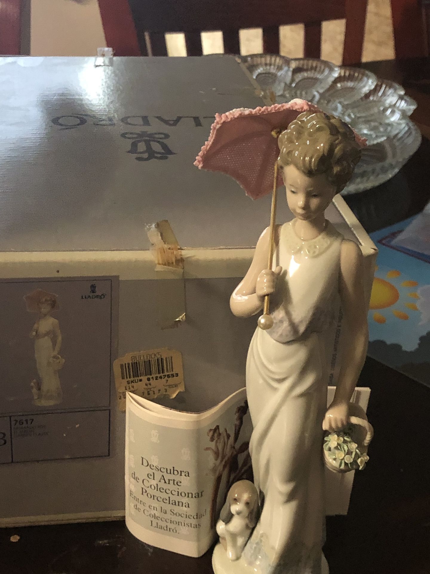 Vintage Lladro figurine of woman with puppy and flowers