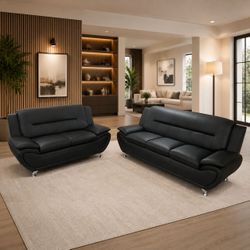 Black faux leather 2 piece sofa and loveseat set