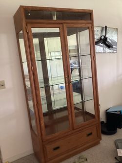 Glass cabinet with drawer