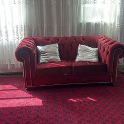 Three sofa couches