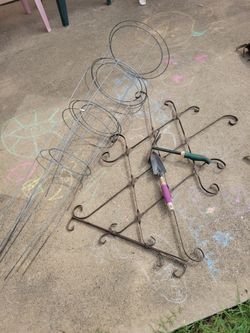 Trellises and 4 tomato cages, 38 " for $5