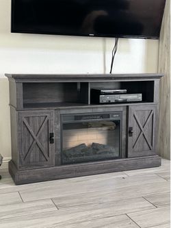 TV media center with fireplace