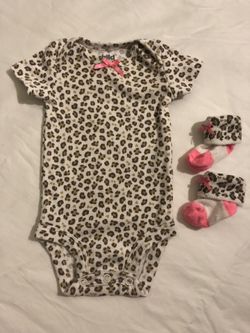 Newborn onesie with matching socks