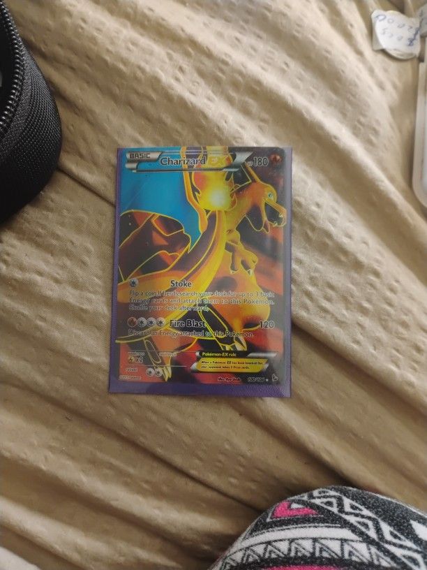 Charizard EX full art card from the Pokemon TCG XY Flashfire set, specifically the 100/106 card. This card is highly sought after