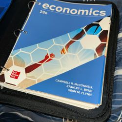 Economics 23e Textbook Loose Leaf (Used NOT abused)