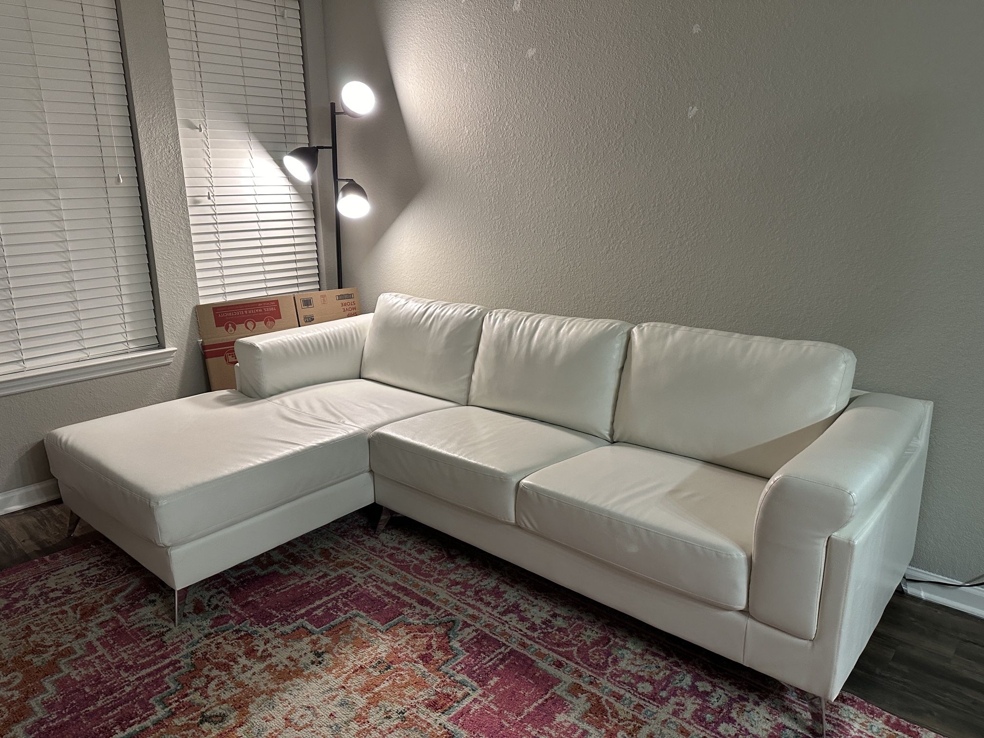white leather city furniture sectional couch