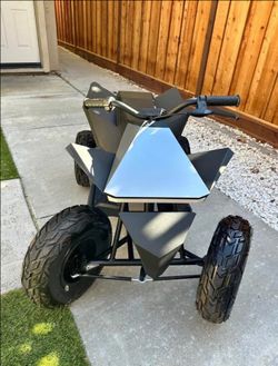 Tesla Cyberquad for Kids 36V Electric Ride-On Quad – Ready to Ride