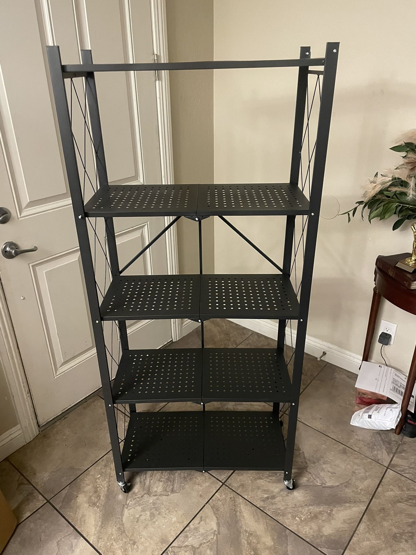 🛠️ 5-Tier Heavy-Duty Folding Metal Storage Shelves – Organize with Ease! 🏡 📍 Pickup Location: Durango/215 by IKEA 📦 Brand New – Perfect for Gara