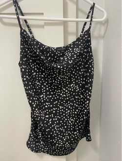 Black blouse with white polka dots