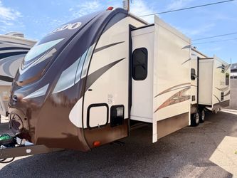 2015 Keystone Laredo 314RE Travel Trailer With 3 Large Slideouts
