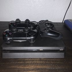 PS4 Slim, 4 Controllers, 5 Games, and all cables 