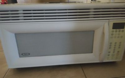 White whirlpool over the range microwave