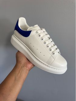 White with blue shoe